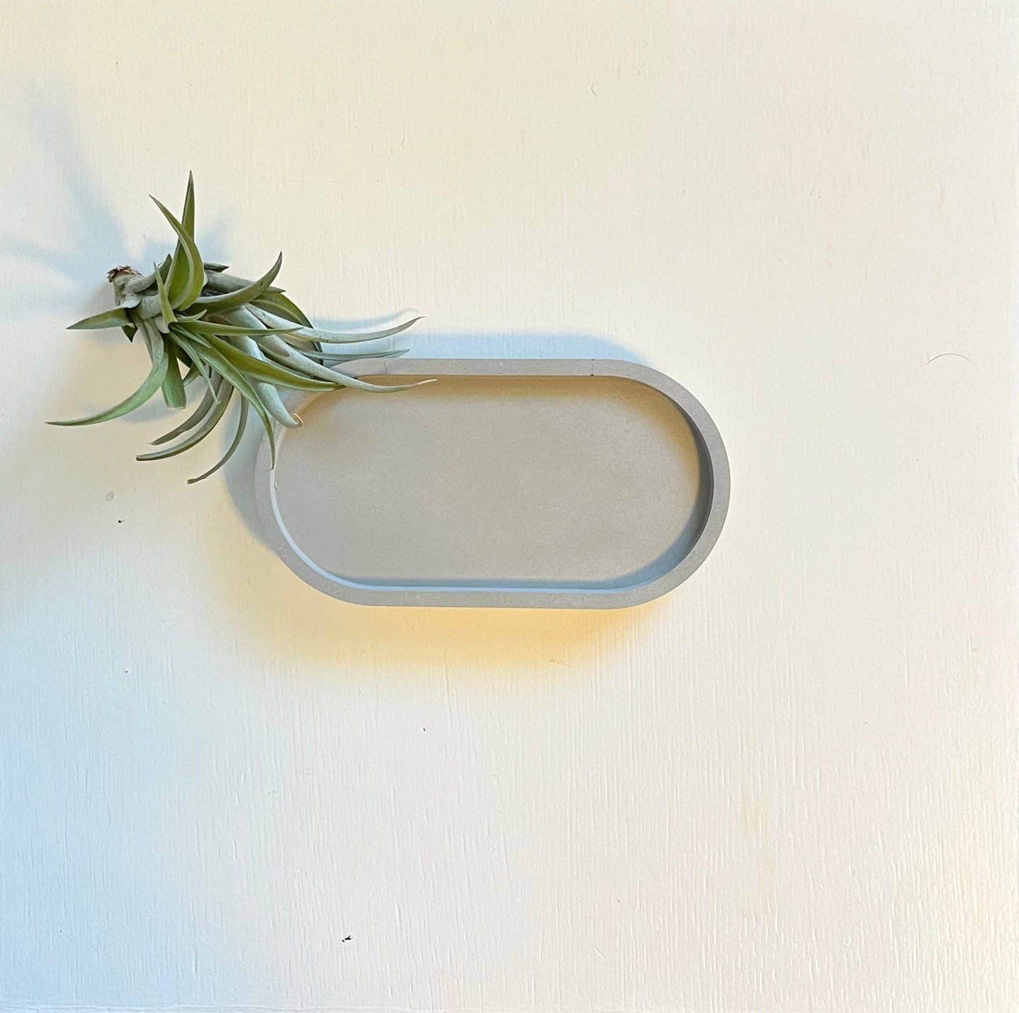 Plateau oval en béton